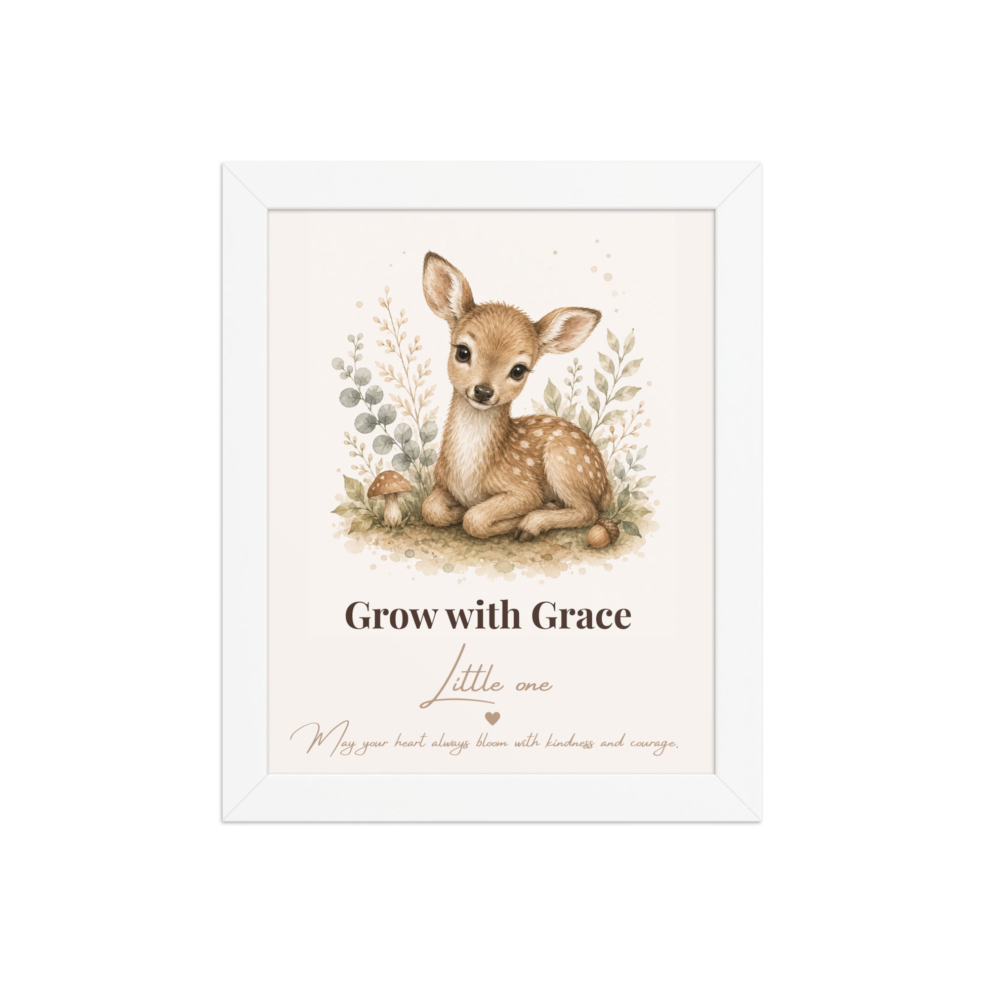 A framed nursery art print featuring a watercolor illustration of a baby deer fawn sitting in a field, with the text 'Grow with Grace Little one' and a quote below, set against a clean white background.